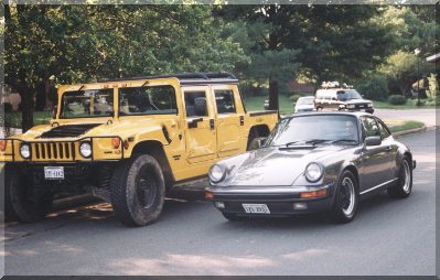 my 911 next to a Hummer